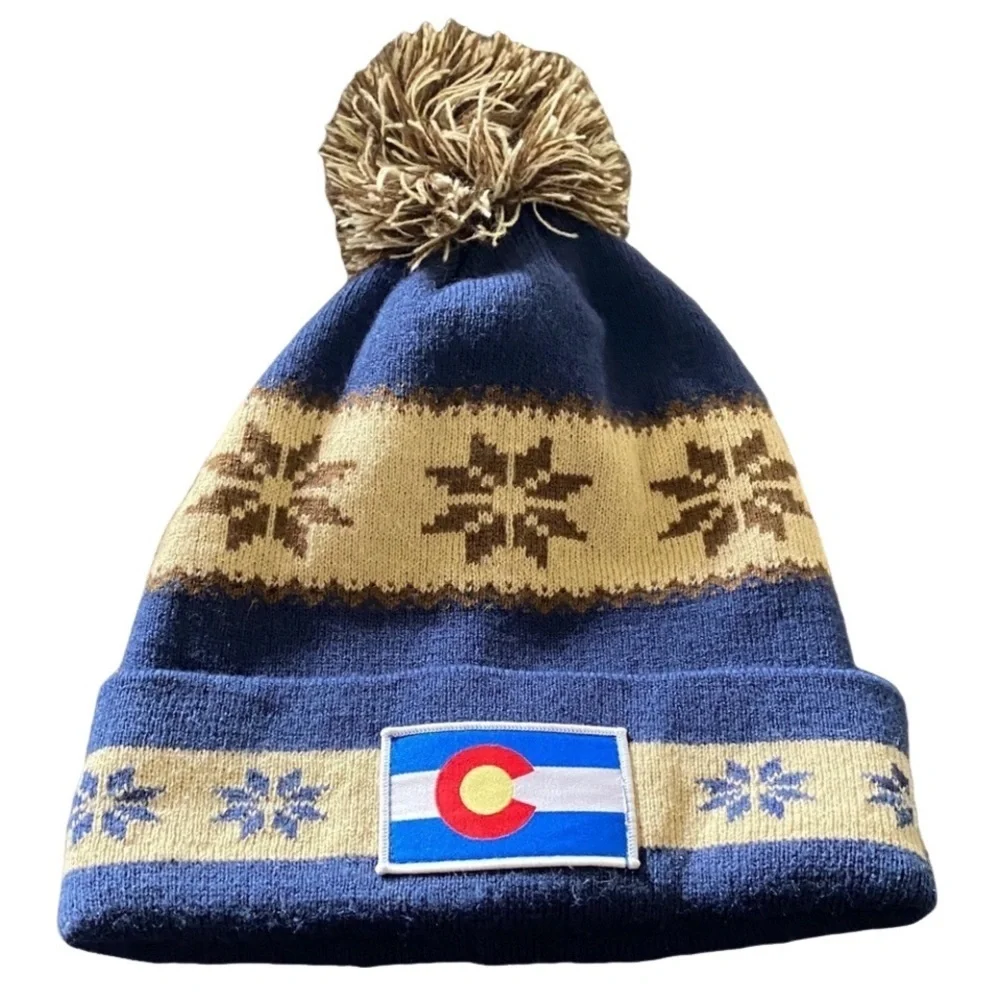 Cirque Blue and Tan Beanie with Colorado Patch. Designed in Vail, CO.
